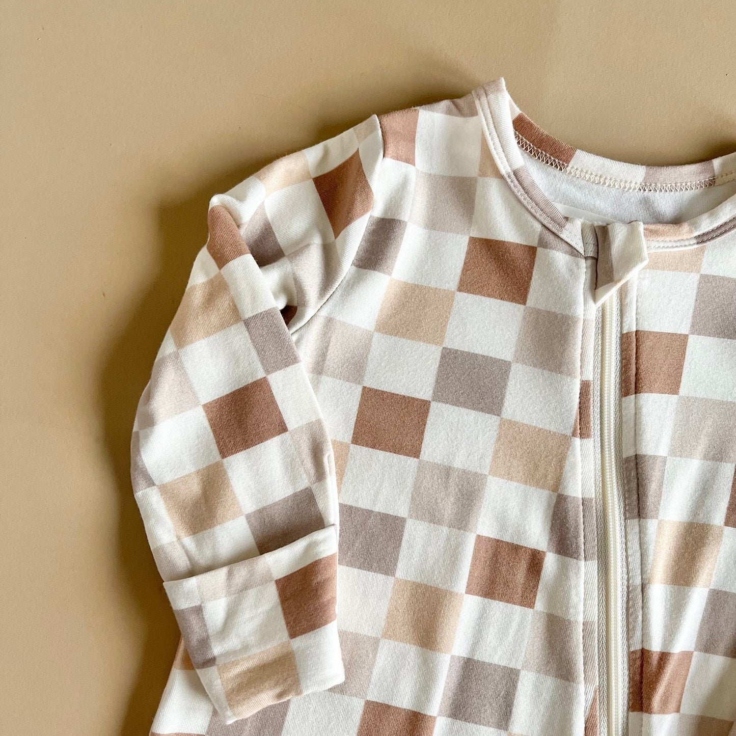 Checkered one piece zip